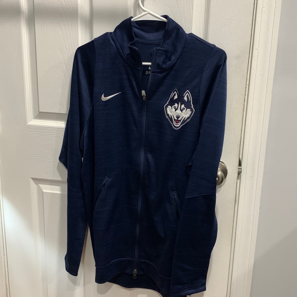 Large zip up jacket, navy, UConn branded. Lightly worn, great condition.